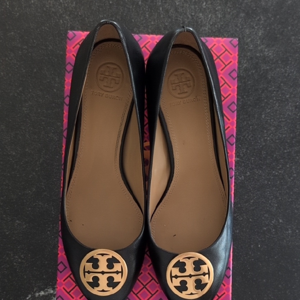 Tory Burch Black and Gold Block Heel Pumps with Signature Medallion